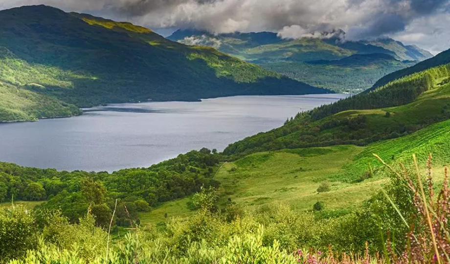 Scenic landscape of water and mountains - Travel Year Round