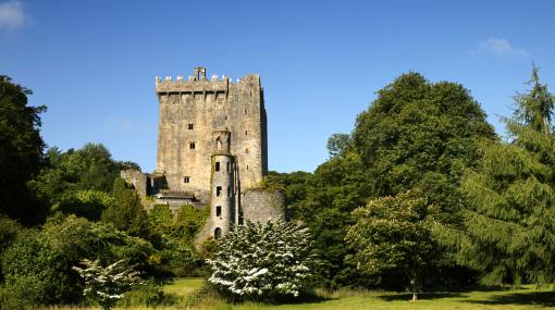 Blarney Castle Blarney Castle in County Cork, a medieval castle in the sunshine surrounded by greenery